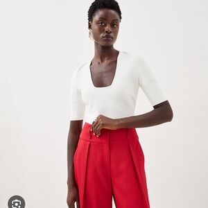 Karen Millen white bandage bodysuit with deep V at front. Size XS. Brand new